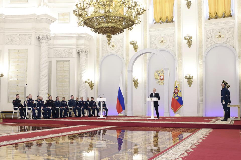 Russian President Vladimir Putin delivers a speech during a ceremony to present Gold Star medals to Heroes of Russia on the eve of Heroes of the Fatherland Day at the St. George Hall of the Grand Kremlin Palace in Moscow, Russia, Friday, Dec. 8, 2023. (Valery Sharifulin, Sputnik, Kremlin Pool Photo via AP)