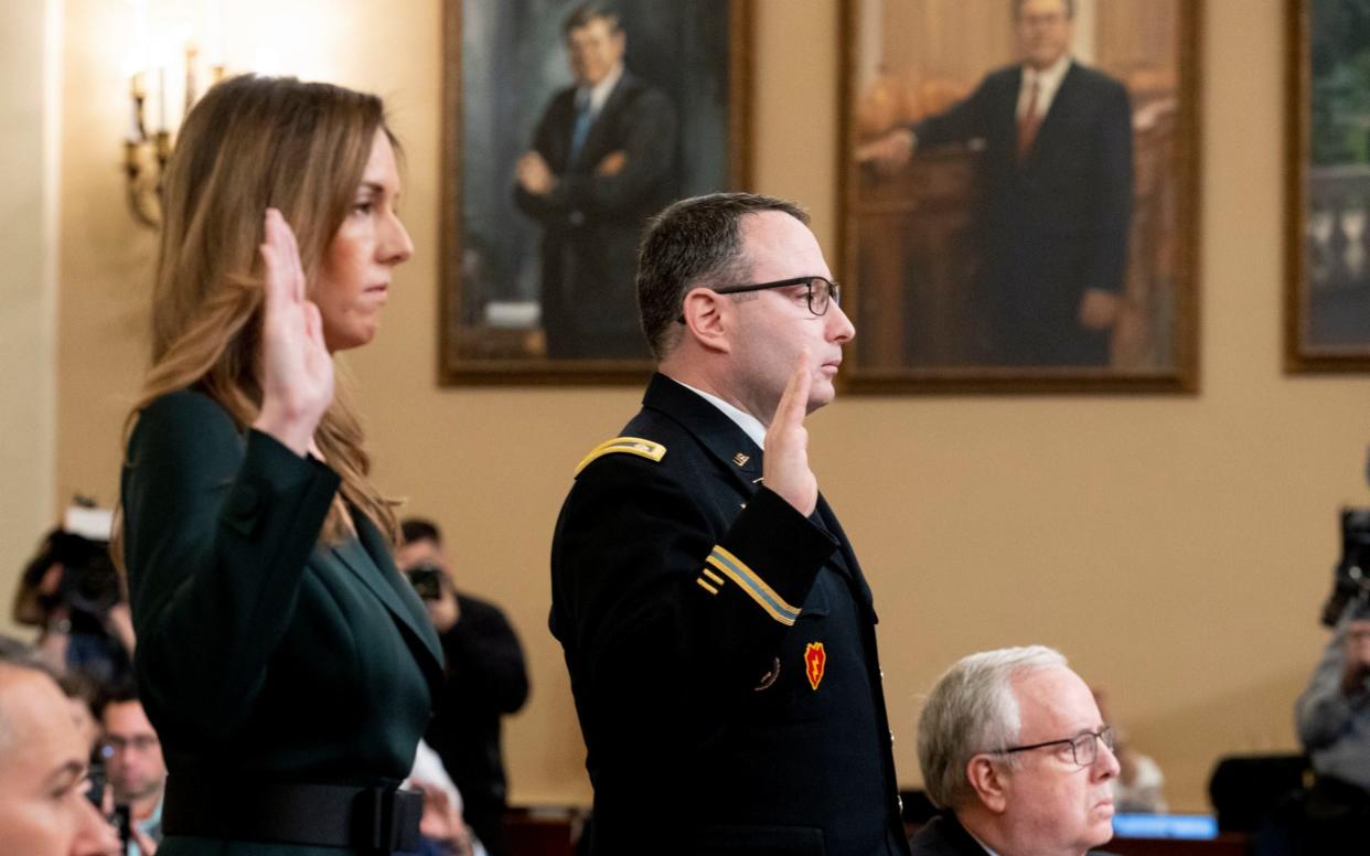 Jennifer Williams and Lt Col Alexander Vindman were sworn in on Capitol Hill on Tuesday - REX