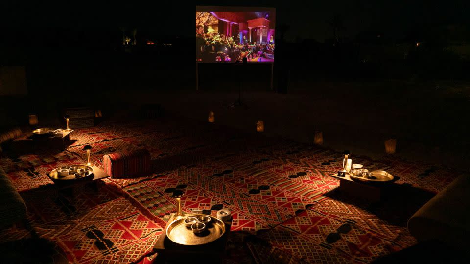 Guests can lie back on rugs to enjoy classic movies at the resort's open-air cinema. - Dimitris Sideridis