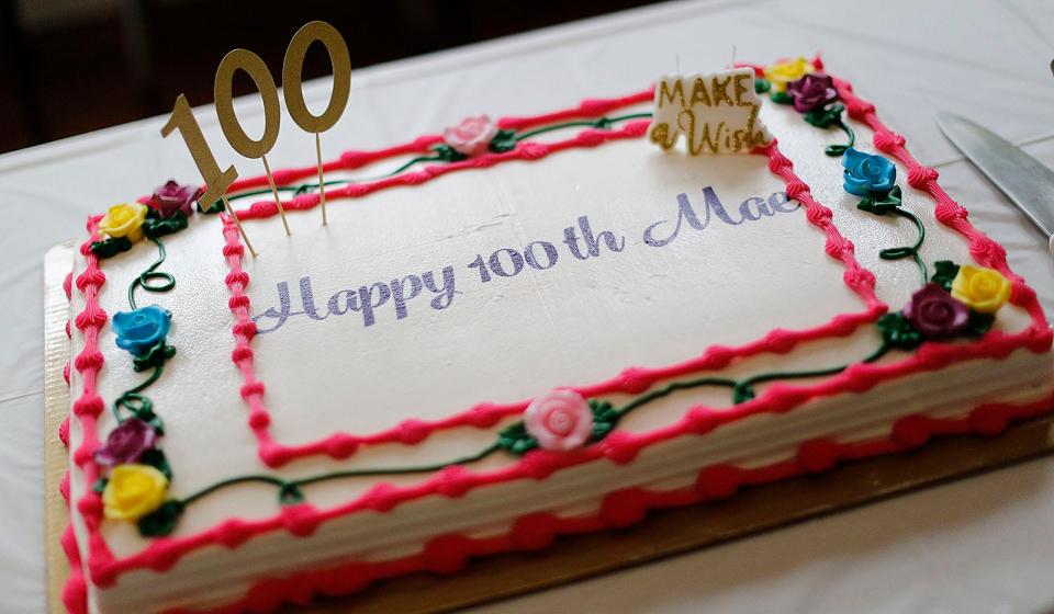 Mary "Mae Ryan, of Milton, celebrates her 100th birthday with friends at the Milton Senior Center on Monday, July 18, 2022.
