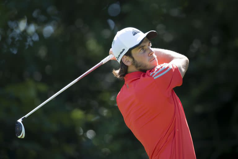 NEWPORT, WALES - JULY 04: Footballer Gareth Bale takes a shot during the annual Celebrity Cup golf tournament at Celtic Manor Resort on July 4, 2015 in Newport, Wales. The Celebrity Cup sees celebrities from England, Wales, Ireland and Scotland competing against each other.  (Photo by Matthew Horwood/Getty Images)