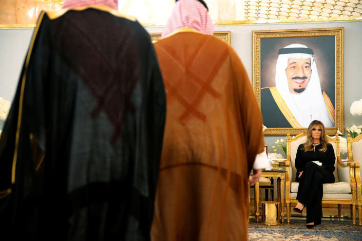 <p>First lady Melania Trump (R) takes her seat next to Saudi Arabia’s King Salman bin Abdulaziz Al Saud (not pictured) as he welcomes her and U.S. President Donald Trump (not pictured) with a coffee ceremony in the Royal Terminal after they arrived aboard Air Force One at King Khalid International Airport in Riyadh, Saudi Arabia on May 20, 2017. (Photo: Jonathan Ernst/Reuters) </p>