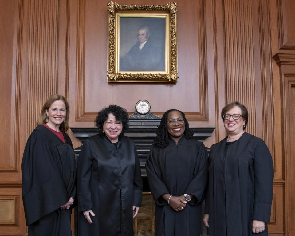 In this image provided by the Supreme Court, from left, Associate Justice Amy Coney Barrett, Associate Justice Sonia Sotomayor, Associate Justice Ketanji Brown Jackson, and Associate Justice Elena Kagan in the Justices’ Conference Room prior to the formal investiture ceremony for Jackson at the Supreme Court in Washington, Friday, Sept. 30, 2022. (Fred Schilling/U.S. Supreme Court via AP)