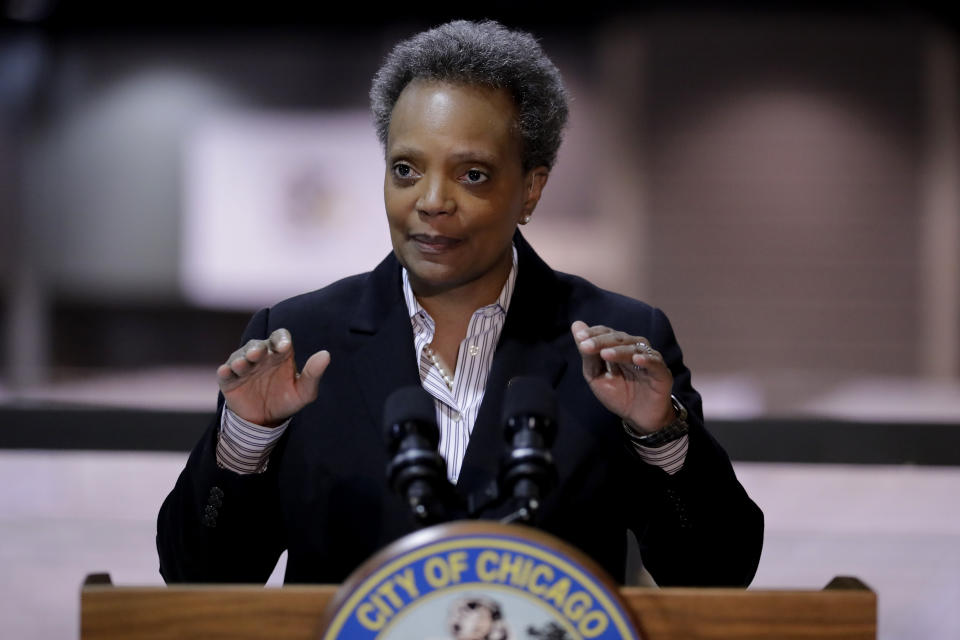 FILE - In this April 10, 2020, file photo Chicago Mayor Lori Lightfoot speaks during a news conference in Hall A at the COVID-19 alternate site at McCormick Place in Chicago. As the coronavirus and protests against police brutality have swept the nation, black female mayors including Atlanta's Keisha Lance Bottoms and Chicago's Lori Lightfoot have led the charge..(AP Photo/Nam Y. Huh, File)