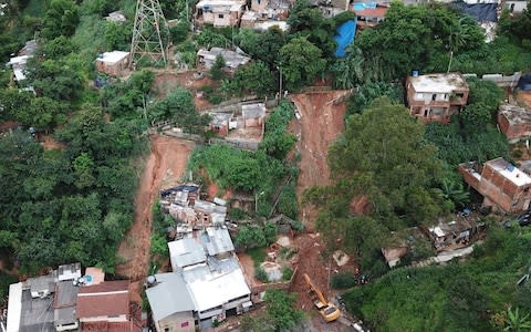 Rescuers are fighting to recover survivors from the mudslides - Credit: DOUGLAS MAGNO/AFP via Getty Images