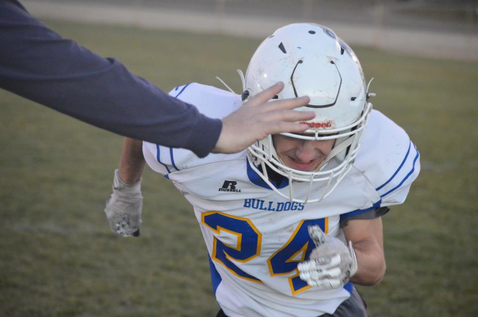 Freshman defensive tackle Isaiah Wortman fights through a block during practice on Wednesday, Dec. 1, 2021.