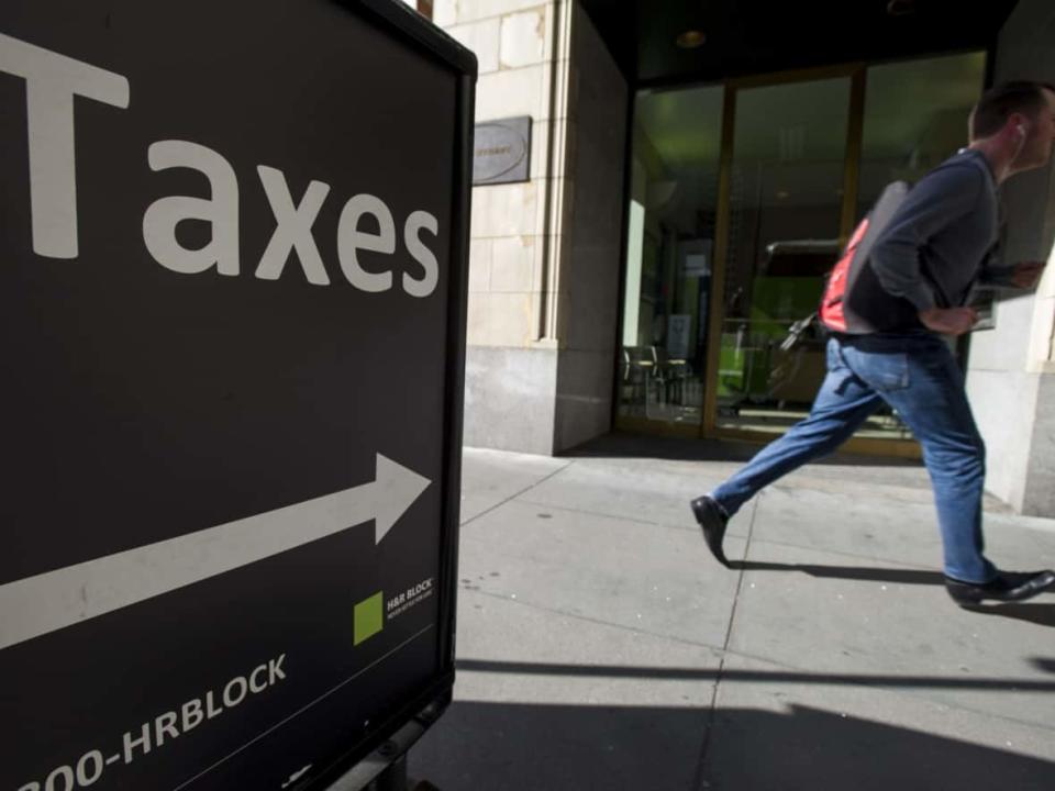 Canada's tax system places the onus for filing on citizens, with some paying for-profit tax preparers for help. But that's not the case in other countries. (David Paul Morris/Bloomberg - image credit)