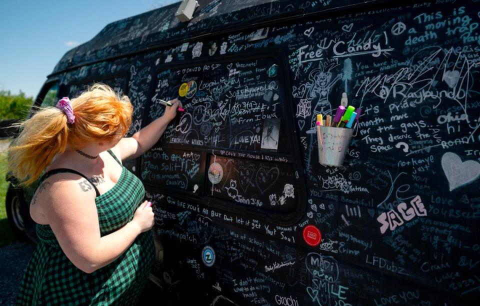 Trie’sena Brown doodles on her van alongside the many signatures and messages from people she meets.
