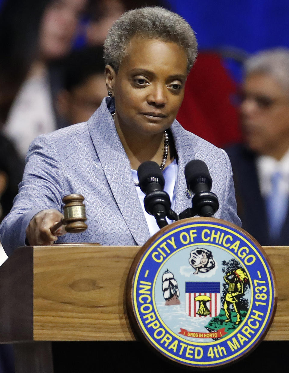 Mayor of Chicago Lori Lightfoot bangs the gavel after being sworn in at her inauguration ceremony Monday, May 20, 2019, in Chicago. (AP Photo/Jim Young)