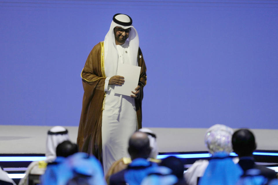 Sultan al-Jaber, the COP28 President-Designate and UAE's Special Envoy for Climate Change, returns to his seat after making his speech, during the ADIPEC. Oil and Energy exhibition and conference in Abu Dhabi, United Arab Emirates, Monday Oct. 2, 2023. Sultan al-Jaber called on oil and gas companies on Monday to be "central to the solution" to fighting climate change, even as the industry boosts its production to enjoy rising global energy prices. (AP Photo/Kamran Jebreili)