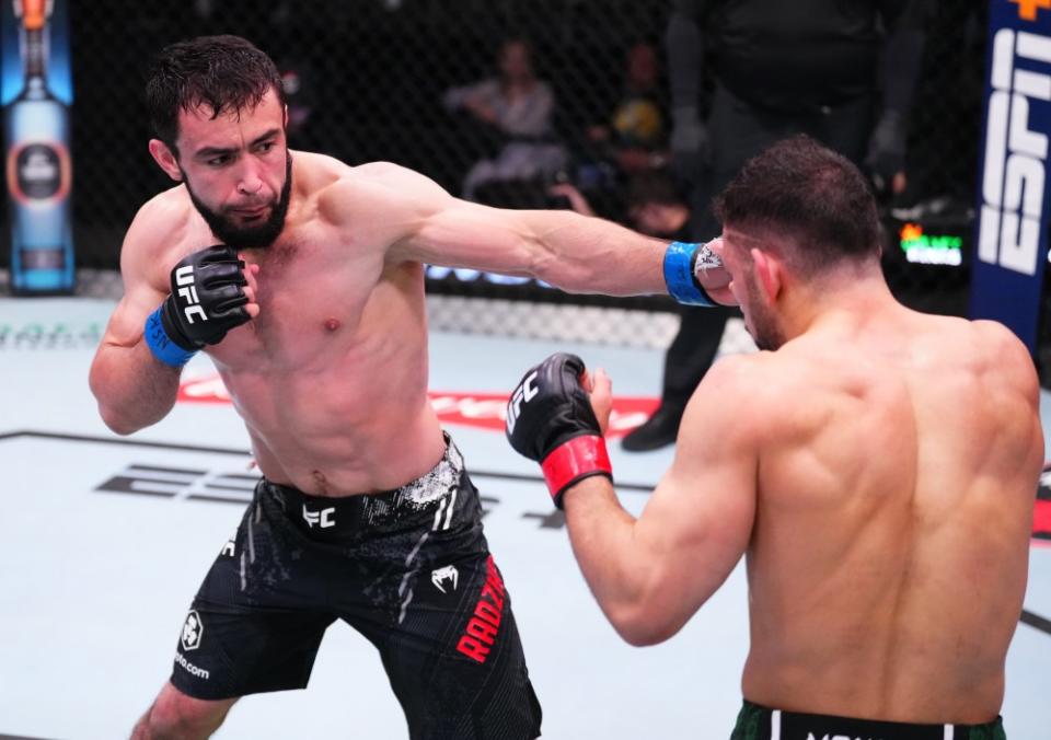 LAS VEGAS, NEVADA – MARCH 02: (L-R) Loik Radzhabov of Tajikistan punches Abdul-Kareem Al-Selwady during the UFC Fight Night event at UFC APEX on March 02, 2024 in Las Vegas, Nevada. (Photo by Jeff Bottari/Zuffa LLC via Getty Images)