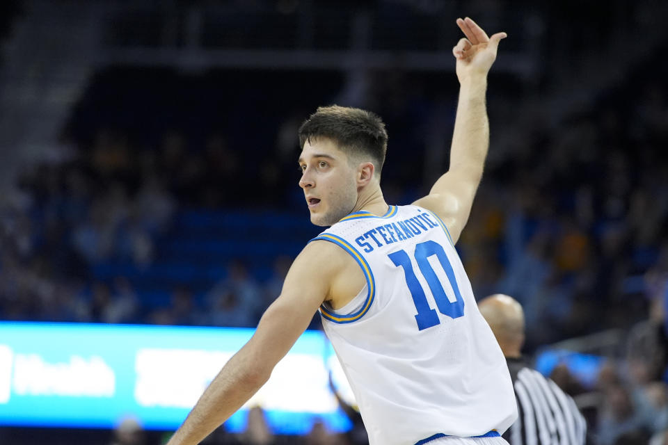 UCLA guard Lazar Stefanovic (10) celebrates his 3-point basket against Arizona State during the second half of an NCAA college basketball game in Los Angeles, Saturday, March 9, 2024. UCLA won 59-47. (AP Photo/Jae C. Hong)