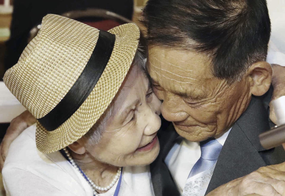 South Korean Lee Keum-seom, 92, left, hugs her North Korean son Ri Sang Chol, 71, during the Separated Family Reunion Meeting at the Diamond Mountain resort in North Korea, Monday, Aug. 20, 2018. Dozens of elderly South Koreans crossed the heavily fortified border into North Korea on Monday for heart-wrenching meetings with relatives most haven't seen since they were separated by the turmoil of the Korean War. (Lee Ji-eun/Yonhap via AP)