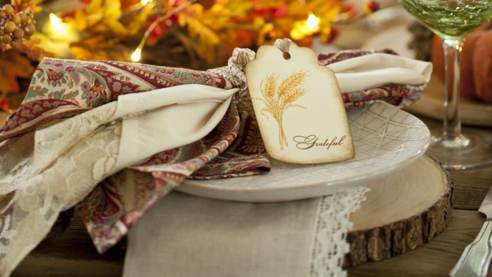 thanksgiving dining table elegant place setting very shallow depth