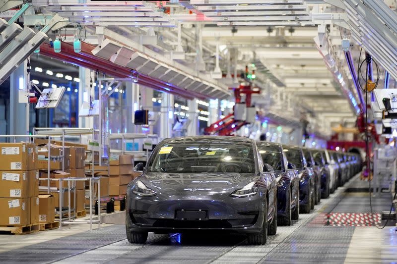 Tesla China-made Model 3 vehicles are seen during a delivery event at its factory in Shanghai