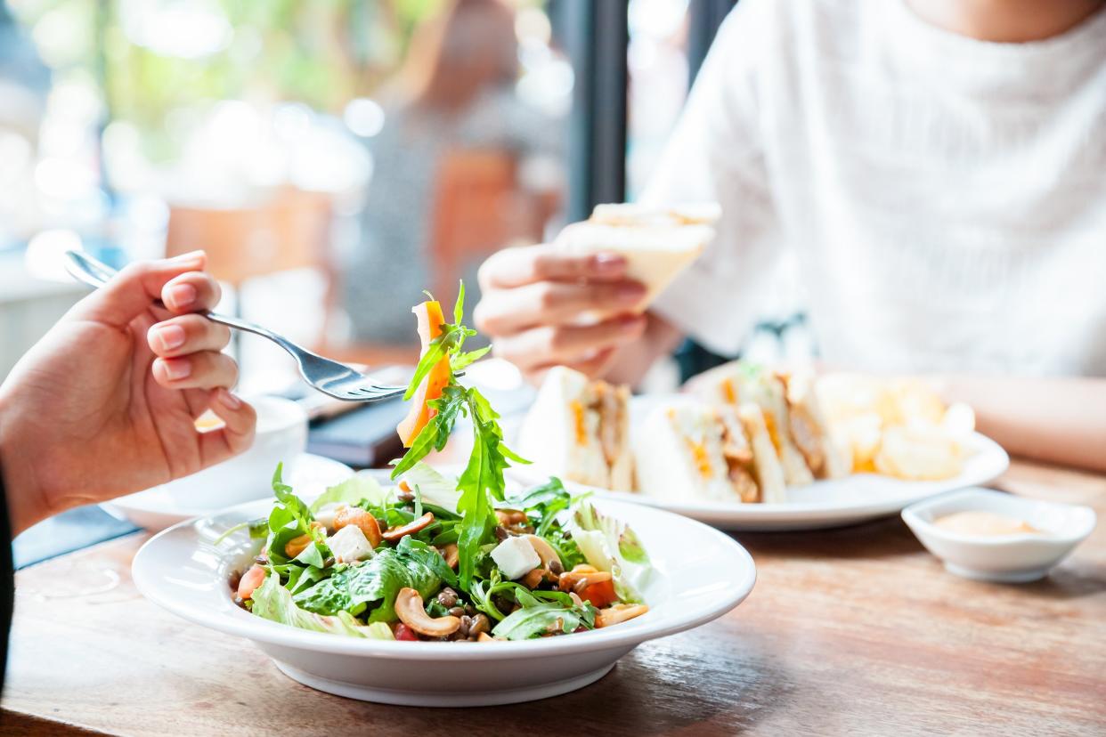 two people having a business meeting over lunch