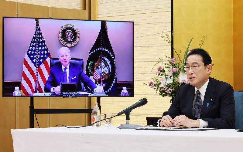 Japan's Prime Minister Fumio Kishida attends a virtual meeting with the U.S. President Joe Biden in Tokyo