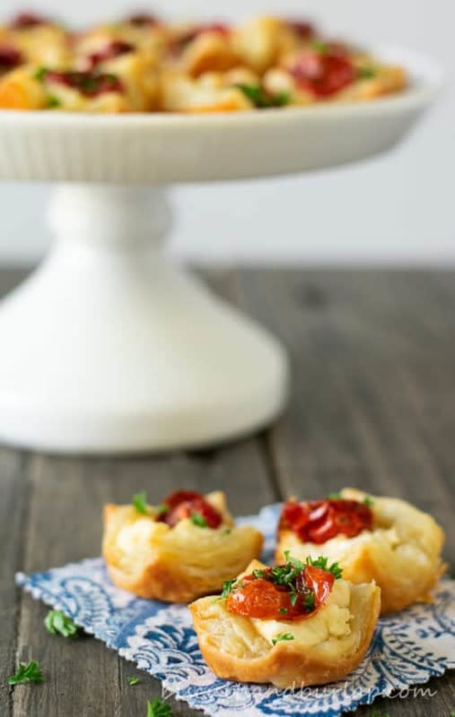 <p>Biscuits and Burlap</p><p>These goat cheese appetizers will become a favorite recipe for a great many reasons. They’re easy to make yet impressive, universally liked, vegetarian-friendly, and beautiful.</p><p><strong>Get the Recipe: </strong><a href="https://www.biscuitsandburlap.com/goat-cheese-appetizers-with-roasted-tomatoes/" rel="nofollow noopener" target="_blank" data-ylk="slk:Goat Cheese Appetizers;elm:context_link;itc:0;sec:content-canvas" class="link ">Goat Cheese Appetizers</a></p>