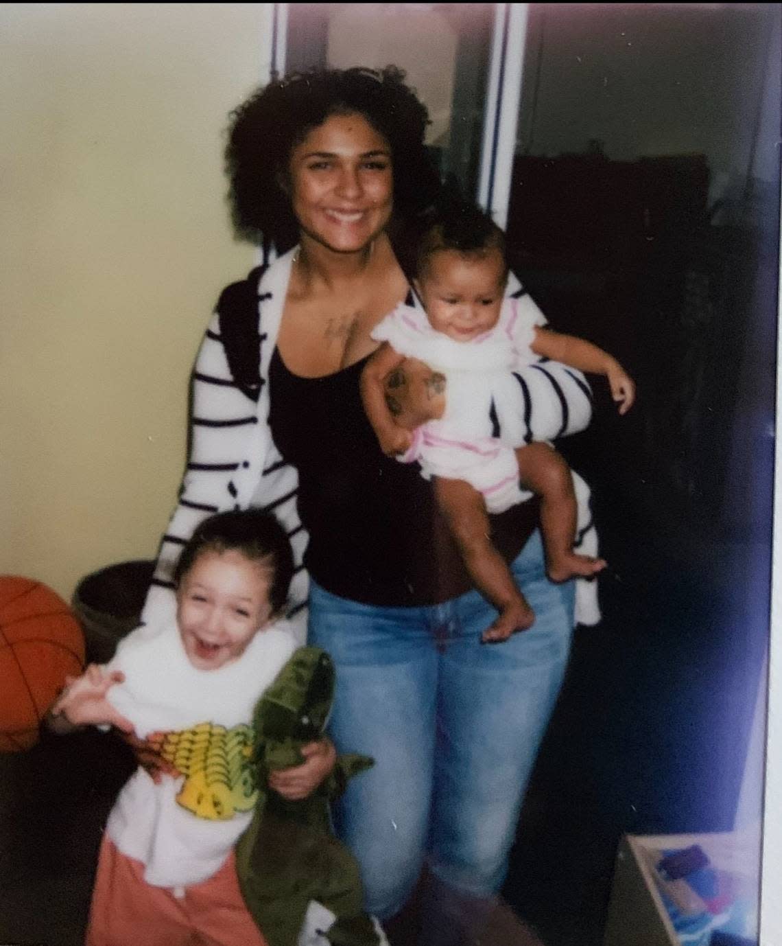 Shayla Curts poses with her two young children before her death. Mars, now 4, and Winter, 10 months, are living with their grandmother, Dezirae Curts.