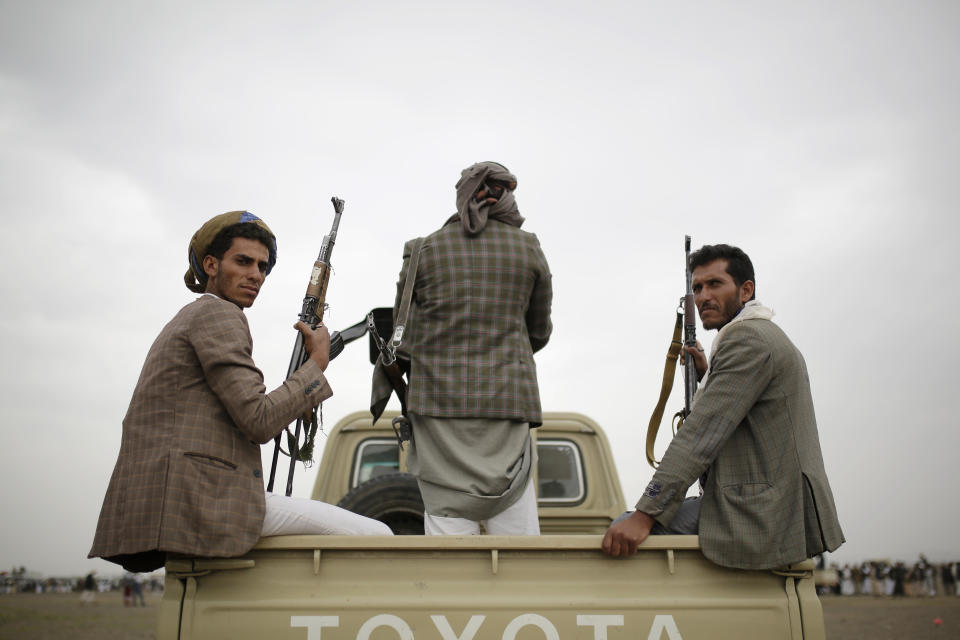 Houthi rebels fighters ride on a truck toward a battlefront following a gathering aimed at mobilizing more fighters for the Houthi movement, in Sanaa, Yemen, Thursday, Aug. 1, 2019. The conflict in Yemen began with the 2014 takeover of Sanaa by the Houthis, who drove out the internationally recognized government. Months later, in March 2015, a Saudi-led coalition launched its air campaign to prevent the rebels from overrunning the country's south. (AP Photo/Hani Mohammed)