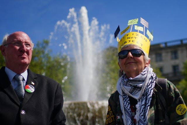 People take part in a rally by anti-monarchy pressure group Republic