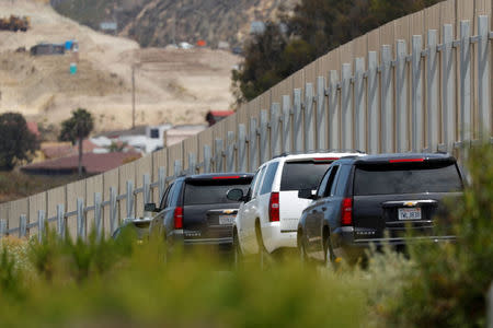 U.S. Attorney General Jeff Sessions' motorcade drives along the U.S.-Mexico border wall following a news conference at the wall near San Diego, California, U.S. May 7, 2018. REUTERS/Mike Blake