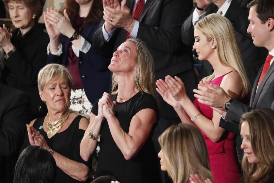 Carryn Owens, widow of widow of Chief Special Warfare Operator William “Ryan” Owens, is applauded on Capitol Hill in Washington, Tuesday, Feb. 28, 2017, as she was acknowledged by President Donald Trump during his address to a joint session of Congress. (AP Photo/Pablo Martinez Monsivais)