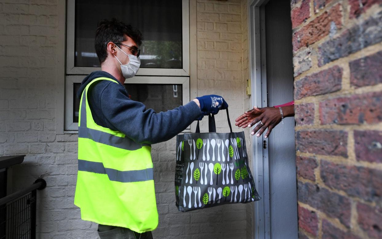 Food is delivered to a shielding householder - Andy Rain/EPA-EFE/Shutterstock