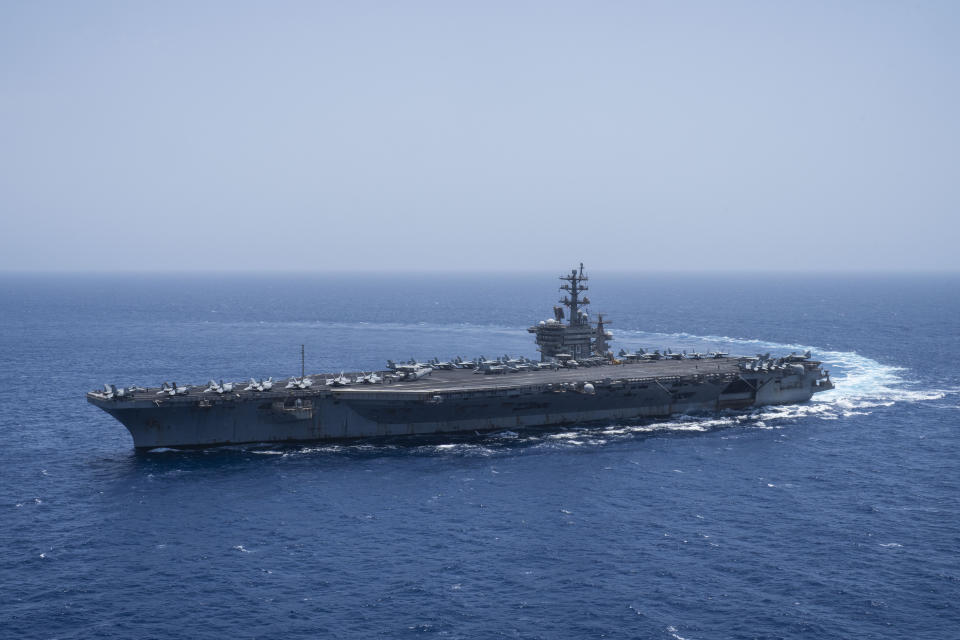 The USS aircraft carrier Dwight D. Eisenhower, also known as 'IKE', sails in the Red Sea on Wednesday, June 12, 2024. (AP Photo/Bernat Armangue)