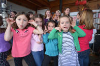 Children of Newton, CT take a break from performing "A Song From Sandy Hook" with Ingrid Michaelson at the home of Chris Frantz and Tina Weymouth of the Talking Heads on January 14, 2013 in Fairfield, Connecticut. (Photo by Michael Loccisano/Getty Images for Tim Hayes)