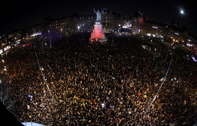 FILE PHOTO: People attend a national gathering to protest antisemitism and the rise of anti-Semitic attacks in the Place de la Republique in Paris