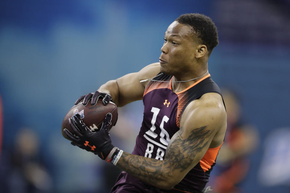 Iowa State running back David Montgomery runs a drill during the NFL football scouting combine, Friday, March 1, 2019, in Indianapolis. (AP Photo/Darron Cummings)