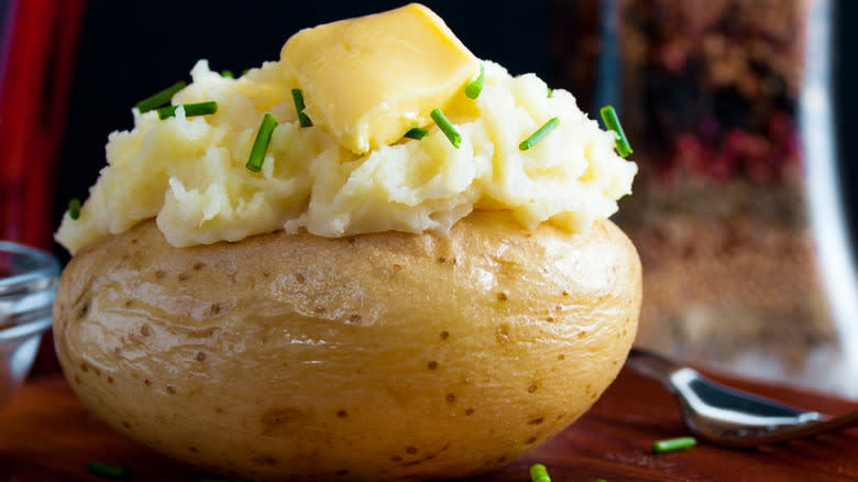 baked potato with butter and chives