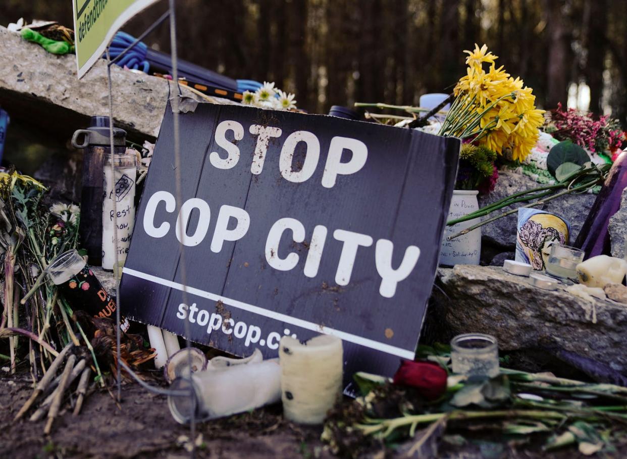 A makeshift memorial in the South River Forest for environmental activist Manuel Terán. <a href="https://www.gettyimages.com/detail/news-photo/makeshift-memorial-for-environmental-activist-manuel-teran-news-photo/1246854231?adppopup=true" rel="nofollow noopener" target="_blank" data-ylk="slk:Cheney Orr/AFP via Getty Images;elm:context_link;itc:0;sec:content-canvas" class="link ">Cheney Orr/AFP via Getty Images</a>