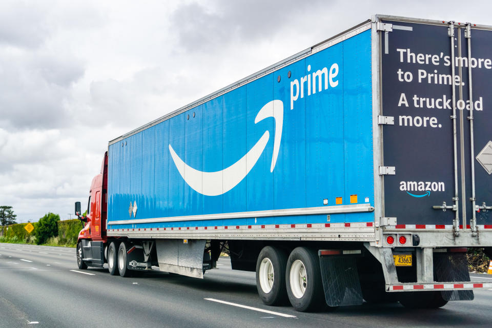 May 26, 2019 Hayward / CA / USA - Amazon truck driving on the freeway, the large Prime logo printed on the side; San Francisco bay area; Amazon.com, Inc., is an American multinational technology company based in Seattle, Washington that focuses on e-commerce, cloud computing, digital streaming and artificial intelligence.