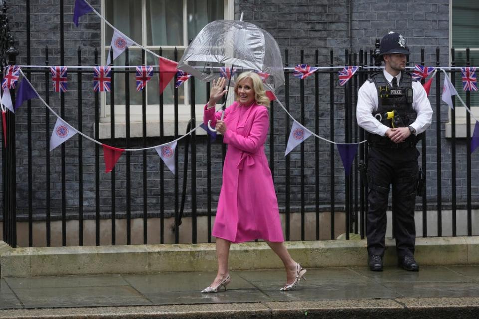 US First Lady Jill Biden waves to the media as she arrives in Downing Street to meet Akshata Murty wife of the British Prime Minister Rishi Sunak in London, Friday, May 5, 2023. The First Lady is in London to attend the Coronation of King Charles III, on Saturday May, 6.(AP Photo/Kin Cheung)