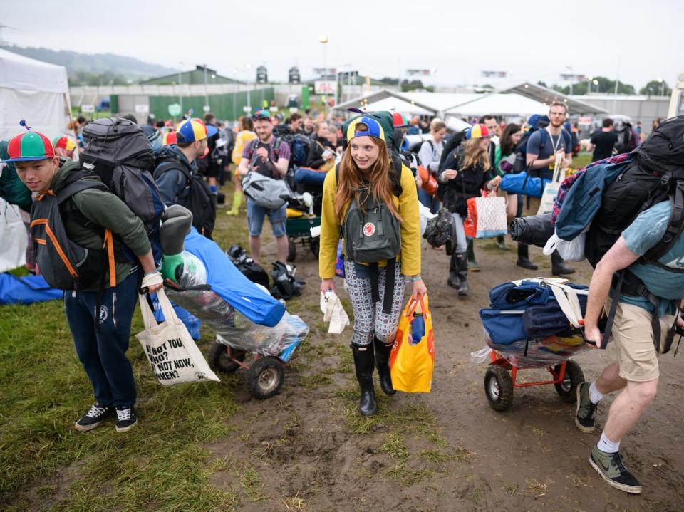 Festivalgoers arrive at Glastonbury’s site in 2019 (Getty Images)