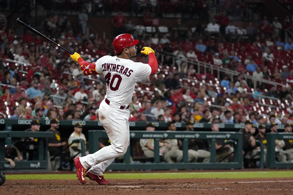 St. Louis Cardinals' Willson Contreras watches his two-run home run during the eighth inning of a baseball game against the San Diego Padres Tuesday, Aug. 29, 2023, in St. Louis. (AP Photo/Jeff Roberson)