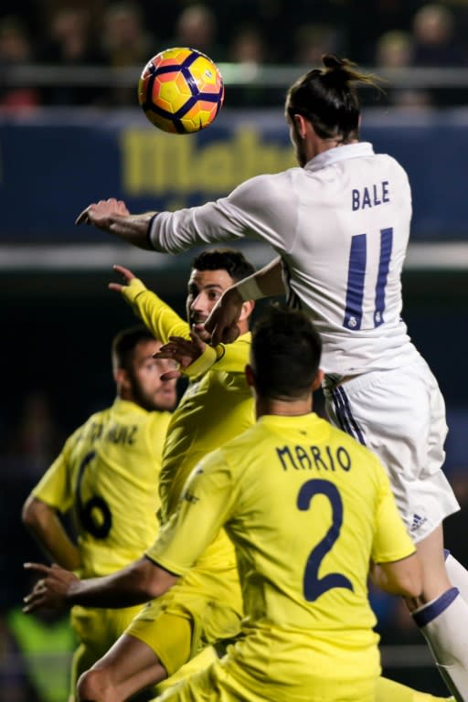 Real Madrid's forward Gareth Bale heads the ball to score a goal against Villarreal on February 26, 2017