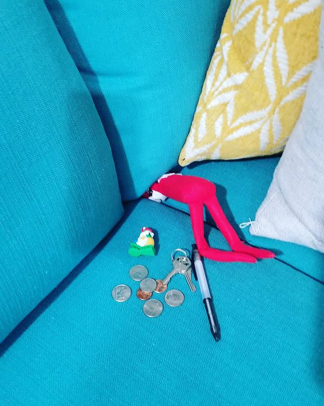 45) Elf on the Shelf getting lost in the sofa