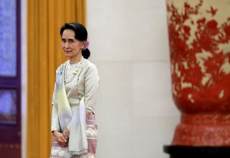 Myanmar State Counselor Aung San Suu Kyi attends a welcoming ceremony at the Great Hall of the People in Beijing, China, August 18, 2016. REUTERS/Jason Lee