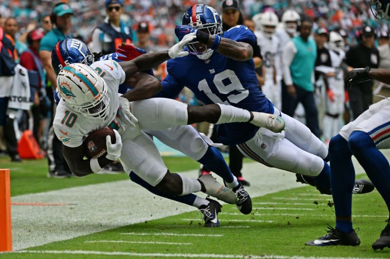 Miami Dolphins wide receiver Tyreek Hill dives for the end zone against the New York Giants on Sunday at Hard Rock Stadium in Miami Gardens, Fla. Photo by Larry Marano/UPI