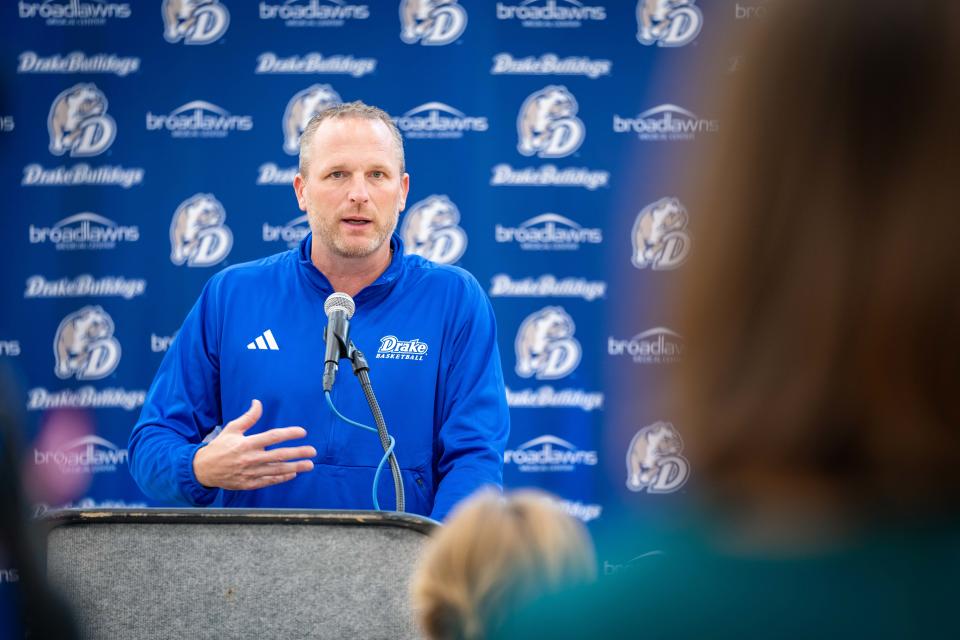 Drake men's basketball coach Darian DeVries speaks Monday during the Bulldogs' media day.