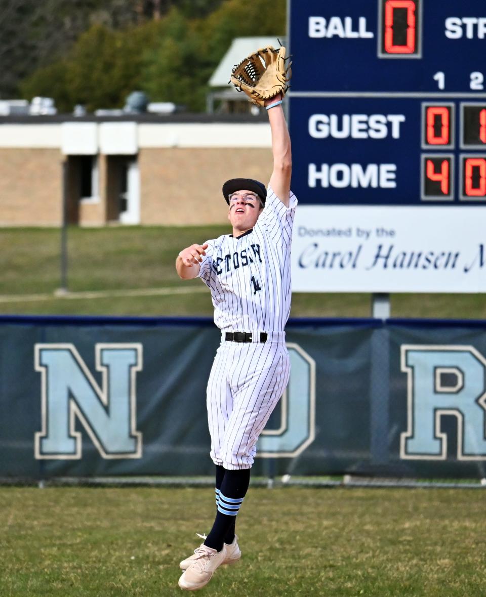 Petoskey's Tyler Goeldel elevates for a ball over second base on Tuesday when TC Central visited Turcott Field.