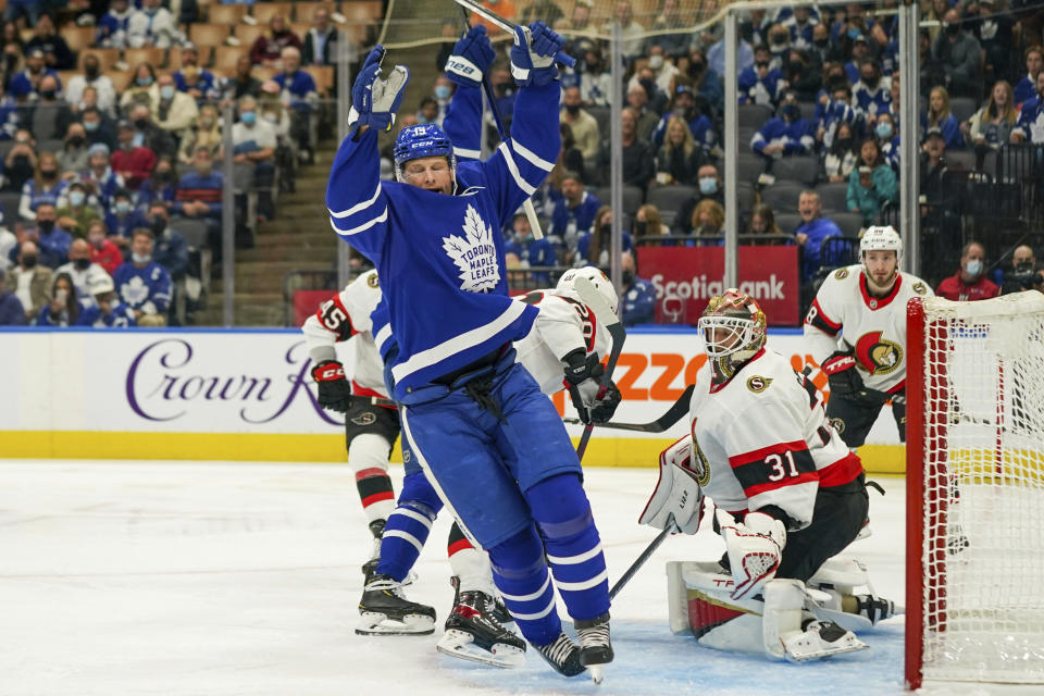 Toronto Maple Leafs forward Jason Spezza (19) celebrates a goal against the Ottawa Senators during first-period NHL hockey game action in Toronto, Saturday, Oct. 16, 2021. (Evan Buhler/The Canadian Press via AP)