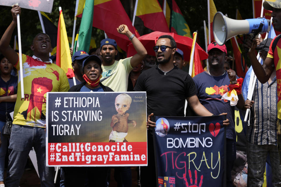 FILE - Members of the Tigrayan community protest against the conflict between Ethiopia and Tigray rebels in Ethiopia's northern Tigray region, outside the the United Arab Emirates embassy in Pretoria, South Africa on Oct. 12, 2022. A South Africa government spokesman says African Union-led peace talks to end Ethiopia's Tigray conflict have begun in South Africa on Tuesday, Oct. 25, 2022. (AP Photo/Themba Hadebe, File)