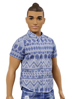 A broad body-style Ken doll. 