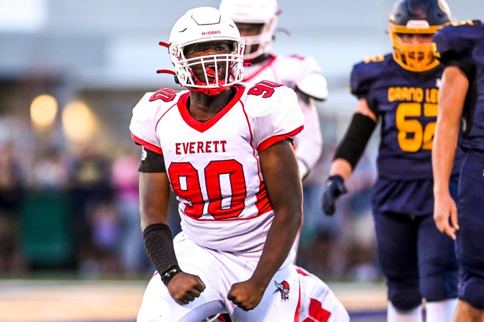 Everett's R'Mon Terry celebrates after a tackle for a loss against Grand Ledge during the second quarter on Friday, Sept. 22, 2023, at Grand Ledge High School.