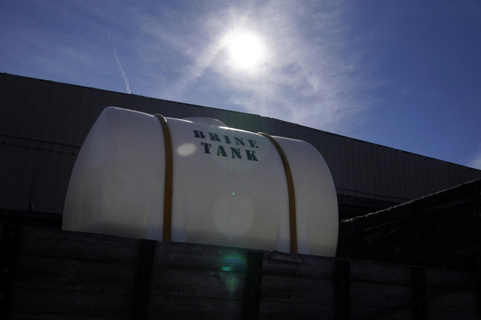 A Georgia Department of Transportation brine tank is seen atop a truck, ahead of a winter storm at the GDOT's Maintenance Activities Unit location on Friday, Jan. 14, 2022, in Forest Park, Ga. A winter storm is headed south that could effect much of Georgia through Sunday. (AP Photo/Brynn Anderson)