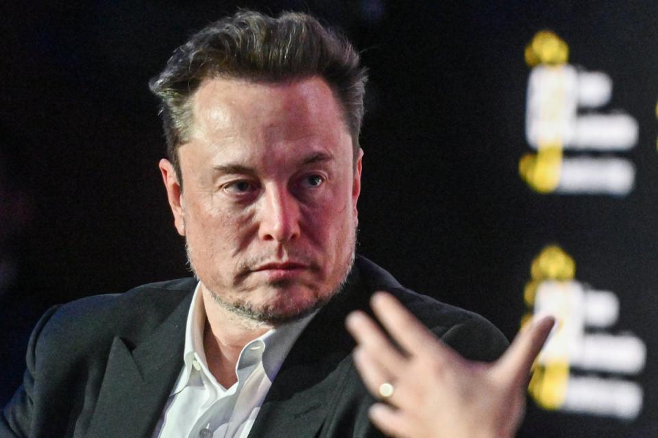 Tesla CEO Elon Musk speaks during live interview with Ben Shapiro at the symposium on fighting antisemitism on 22 January 2024 in Krakow, Poland (Getty Images)